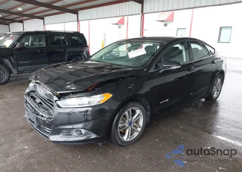2015 Ford Fusion Hybrid Se z USA, uszkodzony, nr VIN 3FA6P0LU3FR257883